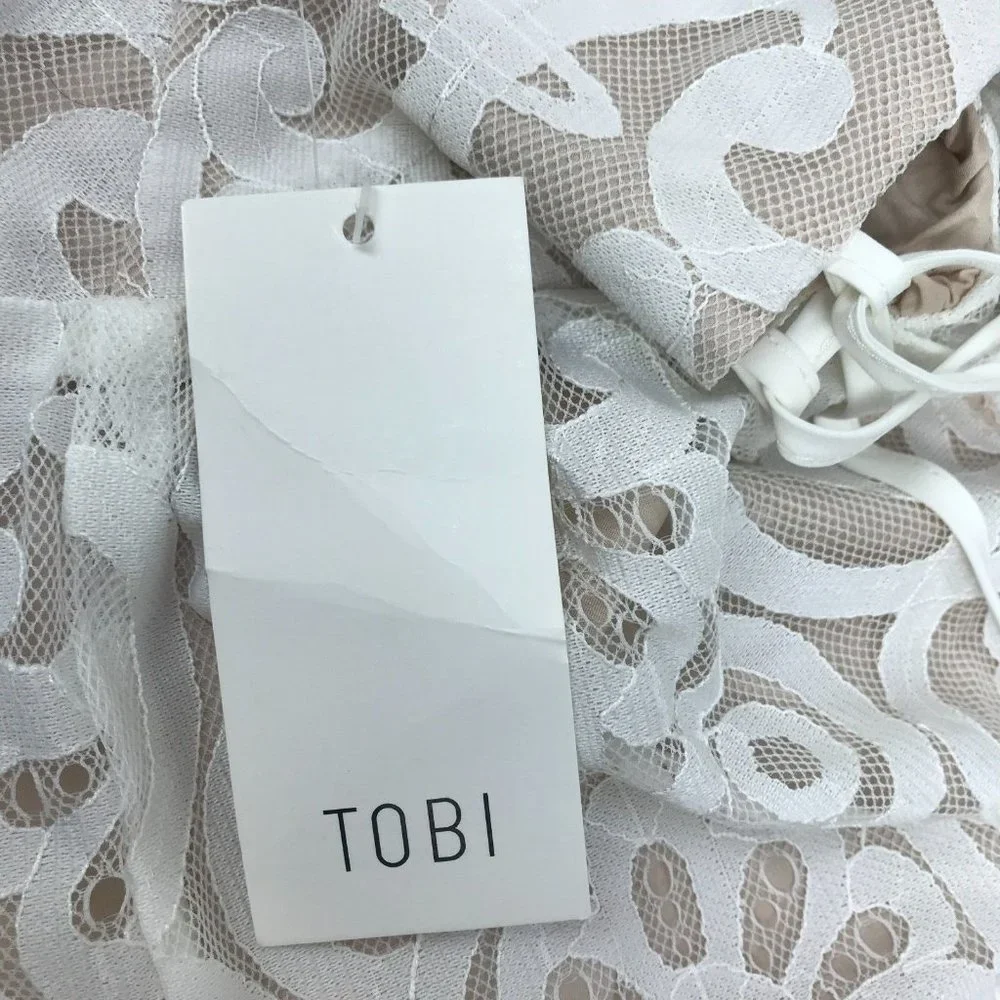 NWT TOBI White Embroidered Lace Romper Criss Cross Lace Up Shorts One Piece SZ M - Picture 8 of 9